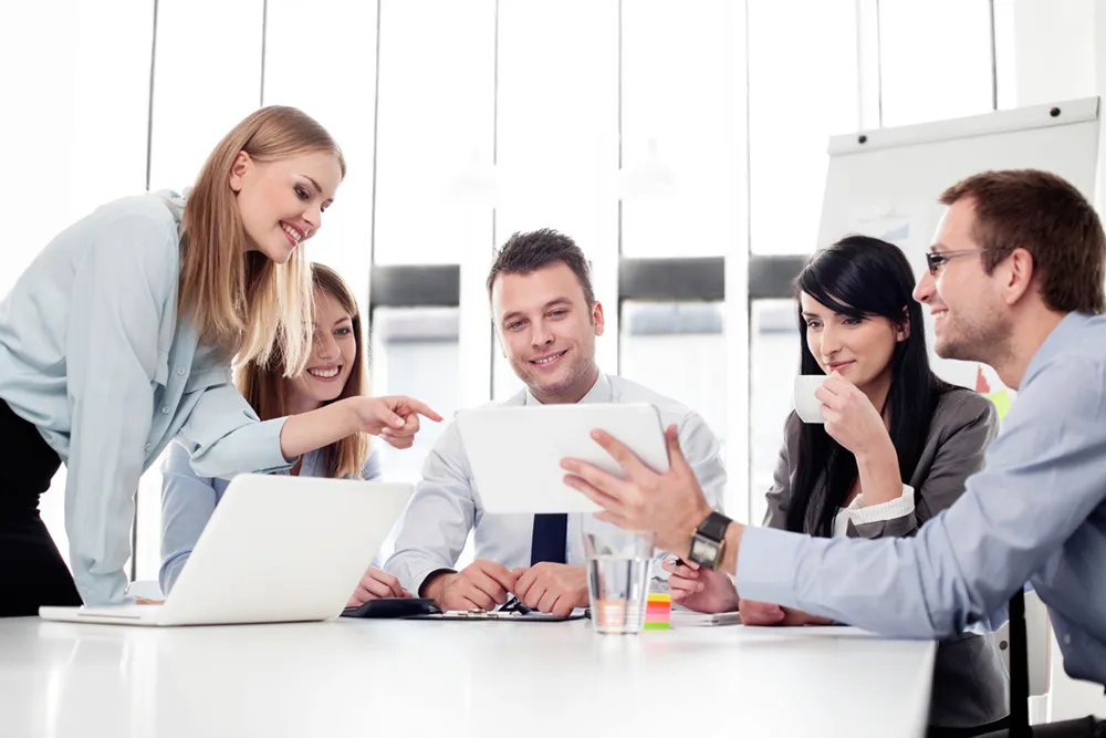 A Group of people sitting around a table